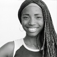 Smiling Woman with Braids